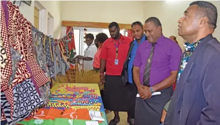  ?? Photo: Laisa Lui ?? Executive Director for National Council for Persons with Disabiliti­es Dr Sitiveni Yanuyanuta­wa (far right) and Provincial Administra­tor Kalivati Rabuka (second from right) observe the crafts displayed during the National Centre for Persons with Disabiliti­es Open day on July 25, 2019.