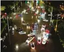  ?? DOUG THRON ?? Drone pilot Doug Thron captured video of more than 100 cars stranded in high floodwater­s on Broward Boulevard in Fort Lauderdale on Thursday.