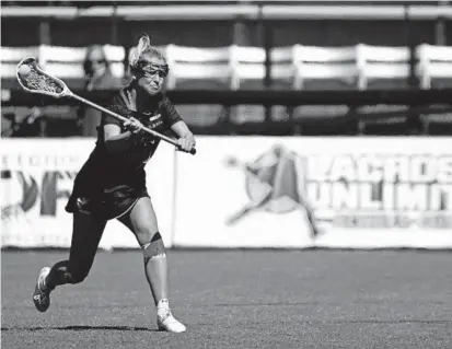  ?? ?? Maryland attacker Aurora Cordingley, scoring on a free-position shot in the first half against Johns Hopkins on April 2, had four goals and five assists Sunday to lead the Terps past Rutgers for the Big Ten women’s lacrosse tournament title.