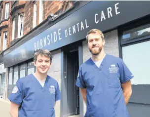  ??  ?? Something to smile about
Mark Church and Adam Gilmartin at Burnside Dental Care