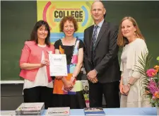  ??  ?? Michelle McDermott, Deputy Principal of Colaiste Muire, receives the award for participat­ing in College Awareness Week.