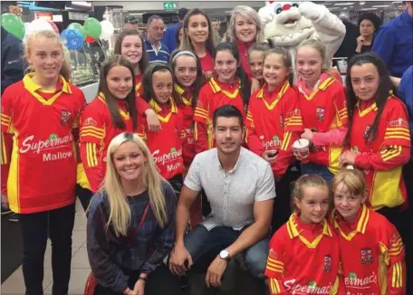  ??  ?? The Mallow Ladies U12 GAA Team with Fair City’s Ryan Andrews and Caroline Harvey at Mallow N20 Plaza Family Fun Day last weekend.