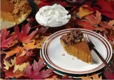  ?? Chicago Tribune/TNS ?? ■ This version of pumpkin pie is topped with a nut-free ginger praline, made from ginger snap cookies and crystalliz­ed ginger.