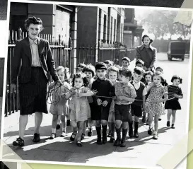  ??  ?? ABOVE Youngsters from the Pimlico day nursery go for a walk – though they’re carefully roped together by their nurse to stop any of them straying on London’s war-ravaged streets