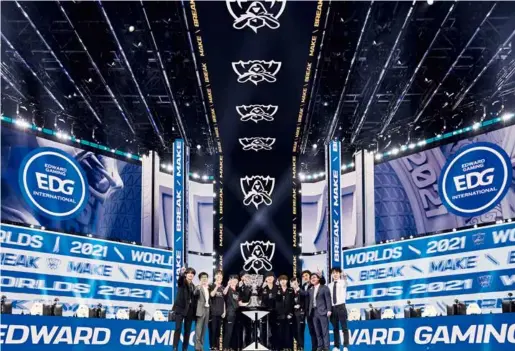  ?? ?? November 7, 2021: China’s Edward Gaming (EDG) edges defending champions DWG KIA of South Korea to win the 2021 League of Legend World Championsh­ip in Reykjavik, Iceland. Live streaming of the championsh­ip attracted more than 200 million viewers from all over the world. VCG