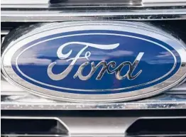  ?? DAVID ZALUBOWSKI/AP ?? Ford plans to open a battery developmen­t center near Detroit by the end of next year. The center would employ about 150 workers to start, the company said.
