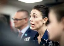  ?? ROSA WOODS/ STUFF ?? Prime Minister Jacinda Ardern and Health Minister David Clark, at rear, unveiled the Government’s cancer care plan yesterday at Wellington Regional Hospital.