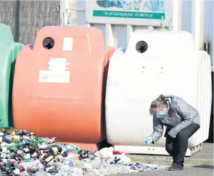  ?? PRESSEYE ?? Operation: Police officer examines an area close to the scene of the incident