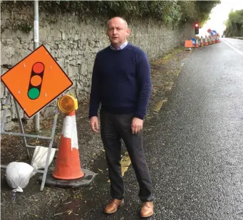  ??  ?? Cllr Wayne Harding at the temporary lights in Slane