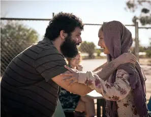 ?? Netflix ?? ■ Fayssal Bazzi, left, and Soraya Heidari in a scene from "Stateless." Co-created and produced by Cate Blanchett, the six-part drama brings together an unlikely group of strangers, including an airline steward running away from a cult, a family of Afghan refugees and a bureaucrat attempting to contain a national scandal.