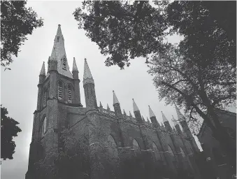  ?? TYLER BROWNBRIDG­E ?? Windsor’s Assumption Church opened in 1845, but was shuttered in 2014 because of being in a state of disrepair. Its fate remains in limbo as major renovation­s are required for it to reopen.