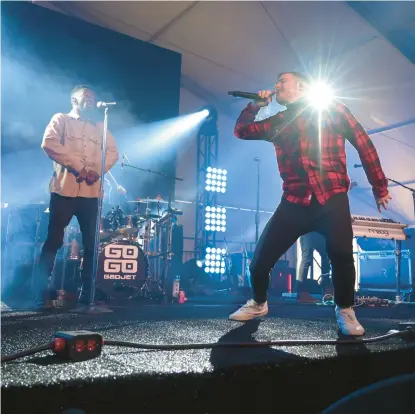  ?? ?? Members of the band Go Go Gadjet perform during the 2023 Maryland State Police Polar Bear Plunge at Sandy Point State Park.
BRIAN KRISTA/BALTIMORE SUN