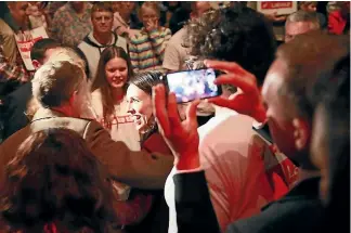  ?? PHOTO: MARK TAYLOR/STUFF ?? Labour’s Jacinda Ardern campaigns in Hamilton yesterday, urging people to enrol and vote.