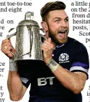  ??  ?? DRINK IT
IN: Ryan Wilson and Calcutta Cup