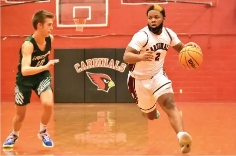  ?? (Pine Bluff Commercial/I.C.
Murrell) ?? Terriek Hayes of Dollarway goes to the basket against William Humiston of Episcopal Collegiate School in the first half Friday at Dollarway Fieldhouse.