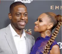  ??  ?? BUSY. Sterling K. Brown is one busy man. But he takes time off his hectic schedule to enjoy the Emmys. He attends the nominees party with wife Ryan Michelle Bathe.