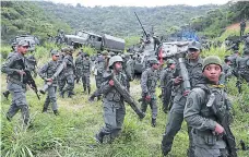  ?? FOTO: AP ?? Venezuela destaca que están allí para combatir el “contraband­o, paramilita­rismo y todos esos males” que vienen de Colombia.