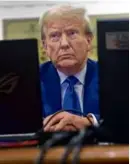  ?? SPENCER PLATT/ASSOCIATED PRESS ?? Former president Trump waited for the continuati­on of his civil fraud trial at New York Supreme Court Wednesday.