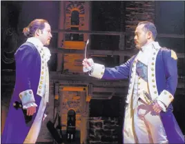  ?? Joan Marcus ?? Joseph Morales (as Alexander Hamilton) and Marcus Choi (as George Washington) in the national tour of “Hamilton,” which will visit The Smith Center May 29-June 24.