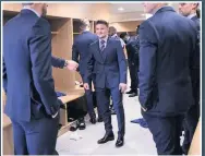  ??  ?? SUITED & BOOTED Trippier and England team-mates