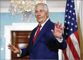  ?? CAROLYN KASTER / ASSOCIATED PRESS ?? Secretary of State Rex Tillerson turns to leave after photos with Libyan Prime Minister Fayez al-Sarraj in Washington on Friday. Tillerson dismissed as “laughable” reports that the White House is trying to replace him as secretary of state with current...