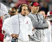  ?? GETTY IMAGES 2017 ?? Alabama coach Nick Saban (left) brought back offensive coordinato­r Steve Sarkisian after he was fired from the Falcons following the 2018 season.