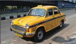  ??  ?? Yellow taxis of Kolkata find themselves edged out by cabaggrega­tors.