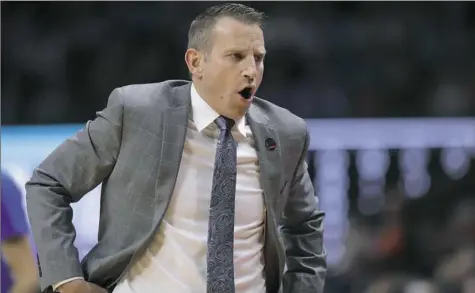  ?? Ted S. Warren/Associated Press ?? Buffalo’s Nate Oats is the latest coach linked to the Pitt opening. He led the Bulls to a 27-9 record this season that included a 21-point upset of Arizona in the first round of the NCAA tournament.