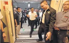  ??  ?? On Friday, Prime Minister Prayut Chan-o-cha chose public mass transit to demonstrat­e the government’s commitment to promote ‘seamless travelling’.