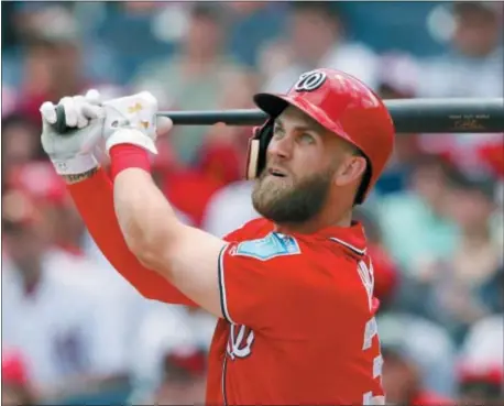  ?? JOHN BAZEMORE — THE ASSOCIATED PRESS ?? Nationals star Bryce Harper will become a free agent after the season and there won’t be any cries of collusion when owners splash the cash to try and bring him aboard.