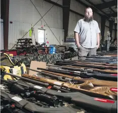  ??  ?? Clint Davisson, an Eastend firearms dealer, says he wouldn’t sell a gun to someone if he wasn’t “comfortabl­e” and always errs on the side of caution.