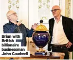  ?? ?? Brian with British billionair­e businessma­n John Caudwell