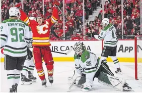  ?? DEREK LEUNG GETTY IMAGES ?? Mikael Backlund of the Flames celebrates his goal against goalie Jake Oettinger of the Dallas Stars during the third period of Game 5 of their first-round playoff series in Calgary on Wednesday night. The Flames won, 3-1.