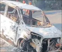  ?? HT PHOTO ?? ▪ A car damaged during the violence.