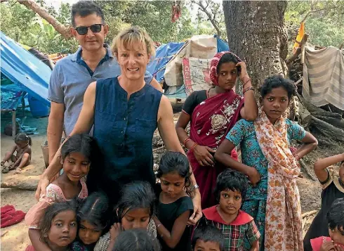  ?? MARK TODD ?? The Todds with an itinerant community from Andhra Pradesh.