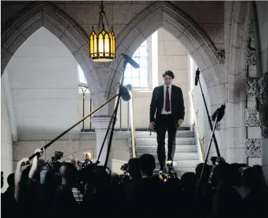  ?? SEAN KILPATRICK /THE CANADIAN PRESS ?? Liberal Leader Justin Trudeau makes his way to Question Period in the House of Commons on Parliament Hill on Monday.