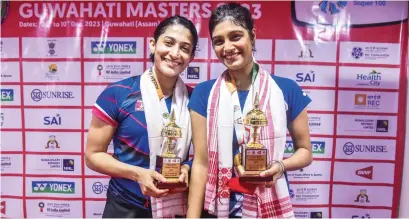  ?? — PTI FILE ?? India’s Ashwini Ponnappa (left) and Tanisha Crasto after winning the doubles title at the Guwahati Masters last year.