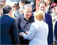  ?? AP FILE PHOTO BY LUCA BRUNO ?? German Chancellor Angela Merkel greets Fiat Chrysler Automobile­s Chairman and CEO Sergio Marchionne during a bilateral meeting, in Maranello, Italy, in 2016. On Wednesday, Fiat announced Marchionne had died.