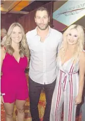  ??  ?? From left, Jessica Blaylock, Roberto Luongo and Racquel Goldy make memories at the tournament.