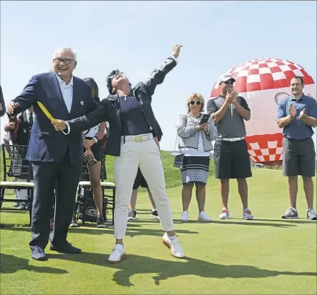  ?? Nate Guidry/Post-Gazette ?? Joe Hardy, founder of Nemacolin Woodlands Resort, left, and his daughter, Maggie Hardy Magerko, president of Nemacolin, cut the ceremonial ribbon opening the Shepherd's Rock 18-hole layout this week. Among the celebritie­s on hand: Steelers quarterbac­k...