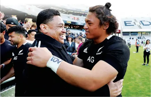  ?? ?? Eroni and Caleb Clarke enjoy the moment after the All Blacks beat Australia at Eden Park last year.