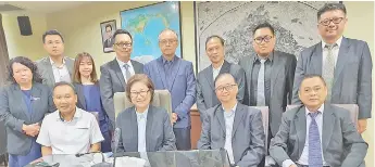  ??  ?? Christina (seated), flanked by Mansur (on her right) and Yong, with the rest of the delegation. Seen at left is Mary.