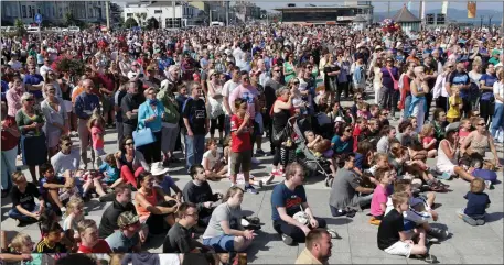  ??  ?? Some of the thousands who watched the match on Bray’s seafront.