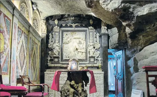  ?? CHRISTIAN ENDER / GETTY ?? La cueva. El santuario dedicado al fundador de la Compañía de Jesús en Manresa es uno de los hitos del camino ignaciano