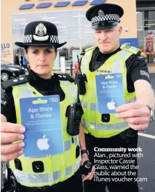  ??  ?? Community work Alan , pictured with Inspector Cassie Glass, warned the public about the iTunes voucher scam