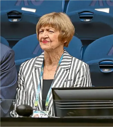  ?? GETTY IMAGES ?? Margaret Court and her husband, Barrymore Court, watch the women’s singles on day one of the Australian Open on Monday.