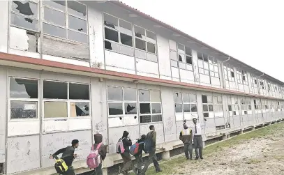  ?? Picture: Mkhuseli Sizani ?? UNDER SIEGE. Arcadia Secondary School in Port Elizabeth is crumbling.