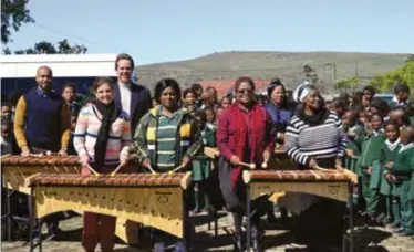  ?? Photo: Azlan Makalima. ?? Access Music Project handing over the marimba to Fikizolo Primary School on Friday 2 October. From left: Matt Maralack( AMP Project Administra­tor), Gareth Walwyn (AMP Project Director), Boudina McConnachi­e (AMP Marimba Facilitato­r), Ntomboxolo Ntanga...