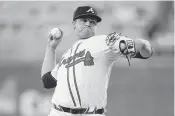  ?? BRETT DAVIS USA TODAY Sports ?? Atlanta’s Bryce Elder, just recalled from Triple A, shut out the Marlins for 62⁄3 innings in a 3-0 win Monday.