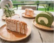  ??  ?? Thai iced tea and matcha tea-flavoured crepe and roll cakes.